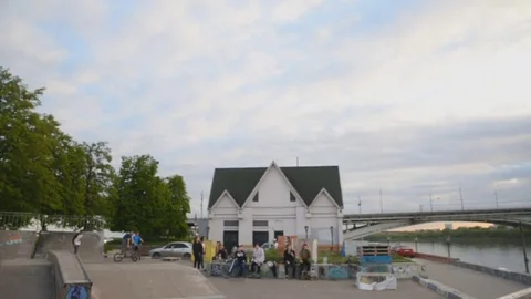 Skateboarder does the trick on the ramp Stock Footage 76618567