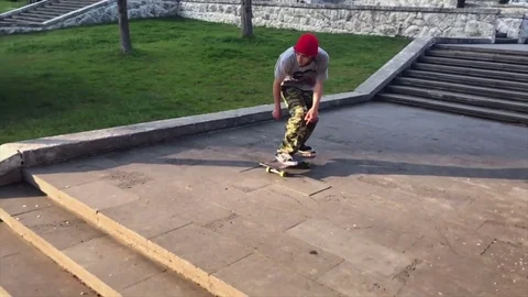 Skateboarder does trick from the steps Stock Footage 77204630