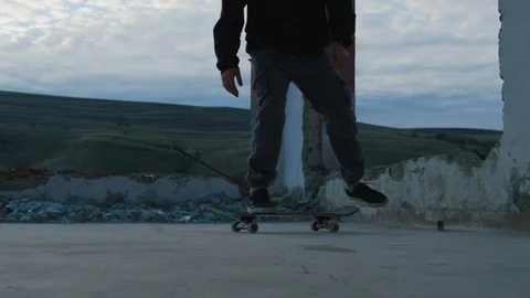 Skateboarder doing a flip Stock Footage 100054581