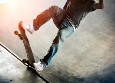 Skateboarder doing a trick Stock Photos