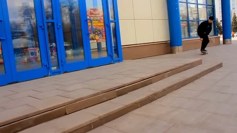 The skateboarder is doing tricks down the steps Stock Footage 71781222