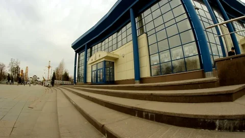 The skateboarder is doing tricks down the steps and falls Stock Footage 71782223