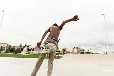 Skateboarder is doing tricks at Parque dos Ventos in the city of Salvador, .. Stock Photos