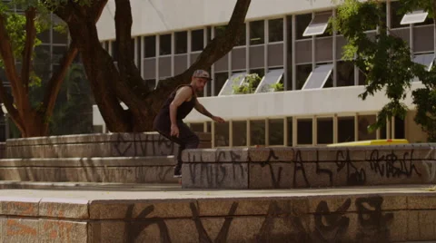 Skateboarder getting off the skateboard while skating Stock Footage 61273876