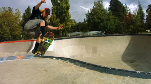 Skateboarder grinding across the screen Video stock 63771391