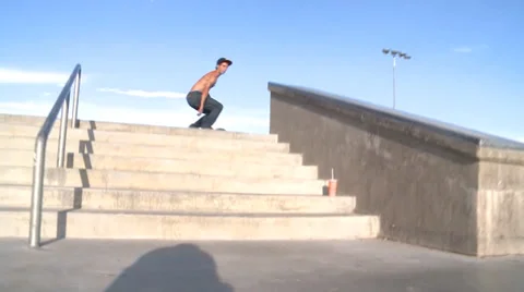 Skateboarder Grinds down Handrail Stock Footage 27829237