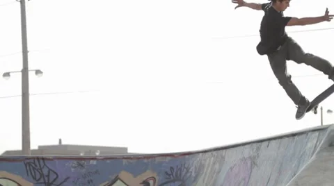 Skateboarder in a half pipe Stock Footage 8836781