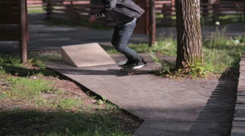 Skateboarder jumping from the kicker Stock Footage 59240918