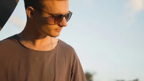 Skateboarder Man at Sunset Stockbeeldmateriaal 76799494