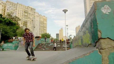 Skateboarder performing an Kick flip Stock Footage 61274865