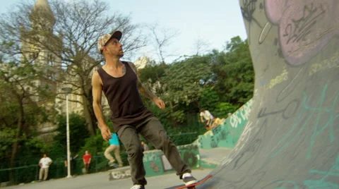 Skateboarder performing a lip trick Stock Footage 61274842
