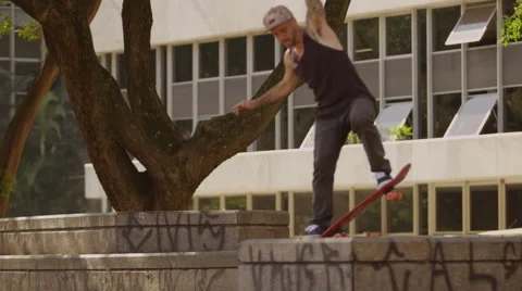 Skateboarder performing skating tricks Stock Footage 61273839