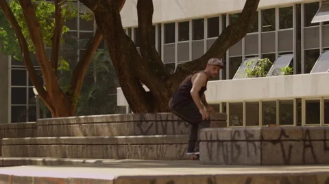 Skateboarder performing skating tricks Stock Footage 61273847