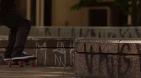 Skateboarder performing skating tricks Stock Footage 61273873