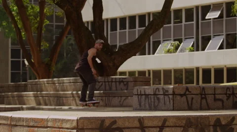 Skateboarder performing skating tricks Stock Footage 61273877