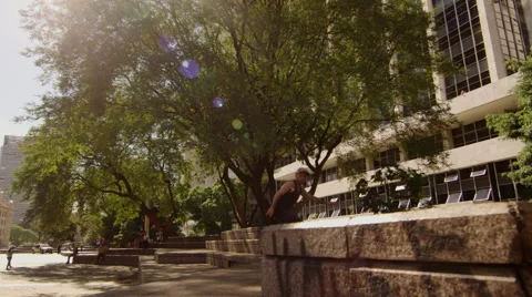 Skateboarder performing skating tricks Stock Footage 61273903