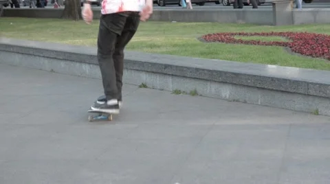 Skateboarder performing a trick at the park Stock Footage 51755869
