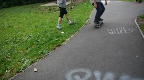 Skateboarder Performs Trick in Park Stock Footage 40868362