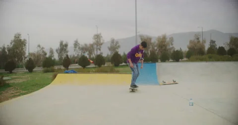 Skateboarder Practicing At The Suli Skate Park in Sulaymaniyah, Iraq Stock Footage 150176360