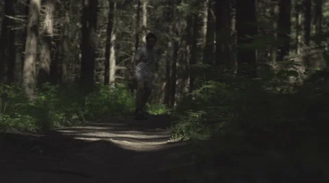 Skateboarder ride in forest Stock Footage 59319007