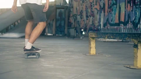 Skateboarder on skate doing jump tricks HD video on skateboard park Stock Footage 67861923