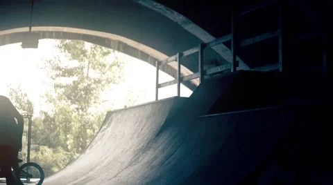 Skateboarder on skate doing tricks HD video slow motion on ramp skateboard park Stock Footage 67861846