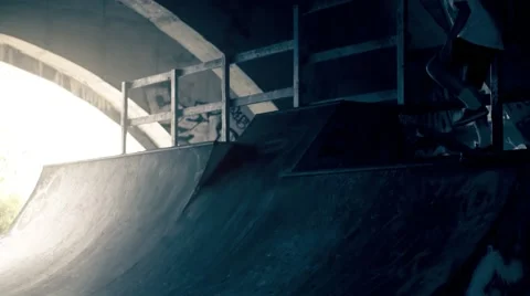 Skateboarder on skate doing tricks HD video slow motion on ramp skateboard park Stock Footage 67861860