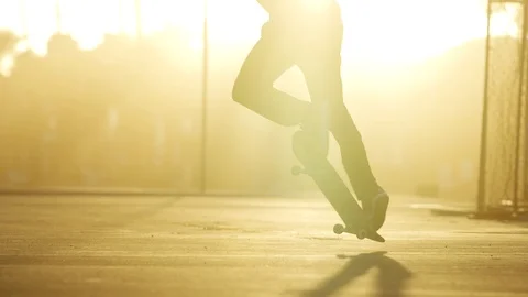 Skateboarder At Sunset 4K Stock Footage 92375113