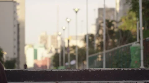 Skateboarder using his mobile phone after climbing the steps Stock Footage 61273057