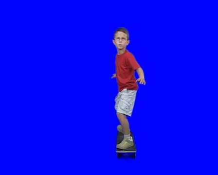 Skateboarding on a blue screen Stock Footage 10714858