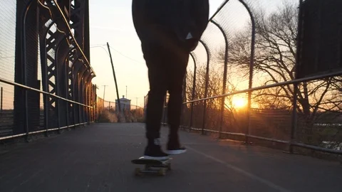 Skateboarding on bridge Stock Footage 88377545