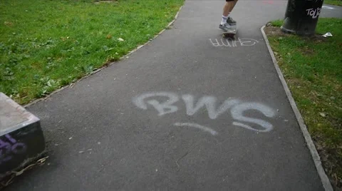 Skateboarding Performs Manuel in Park Stock Footage 40868639