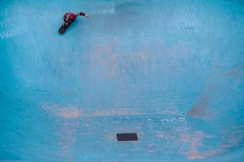 Skateboarding a pool Stock Photos