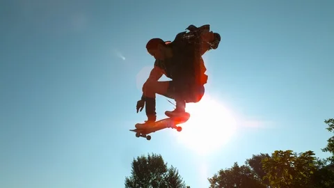 Skateboarding in the sunlight, slow motion Stock Footage 86476659