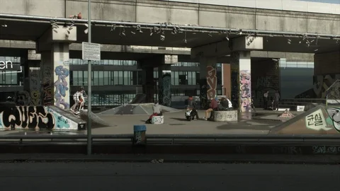 Skateboarding under the bridge Stock Footage 90087991