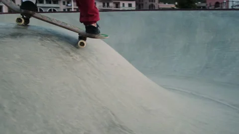 Skater boy is boarding in extreme park in modern city Stock Footage 157447035