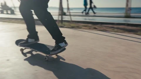 Skater boy practicing at skate park. Young man doing skateboard tricks at Stock-Footage 194454927