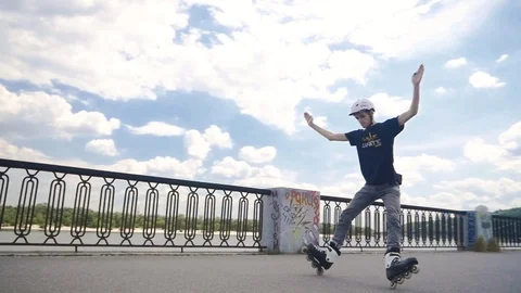 Skater doing hard trick slide - extreme sports Stockbeeldmateriaal 125317755