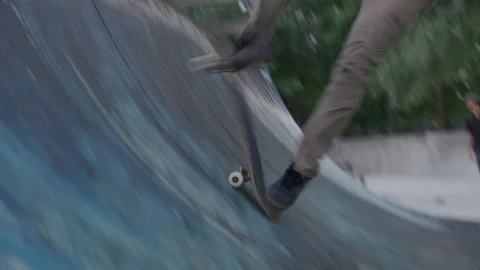 A Skater Doing a Kickflip on a Ramp Stock Footage 208792487
