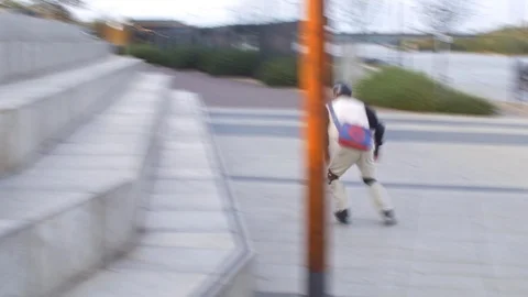 Skater doing series of jumps on inline skates in motion blur Stock Footage 119476485