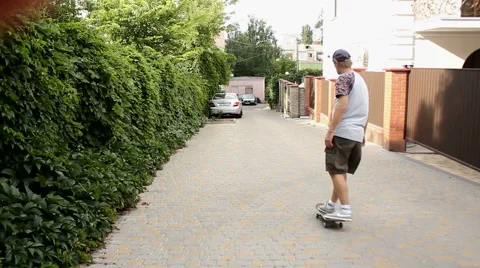 Skater Going Down the Street Stock Footage 52195618