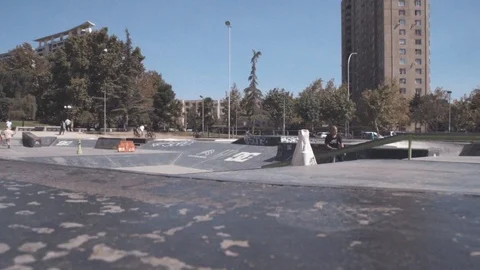SKATER GRIND TRICK ON A PIPE IN A SKATE PARK FAIL TRICK SLOW MOTION Stock Footage 102401516