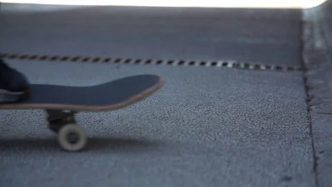Skater performing a trick over wall in slow motion Video stock 71558860