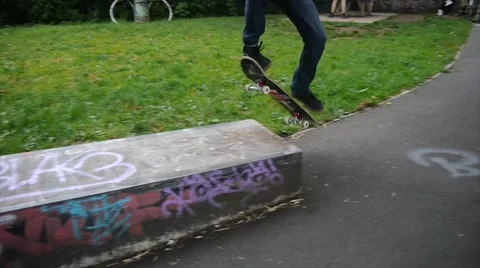 Skater performs Manuel in park Stock Footage 40868648