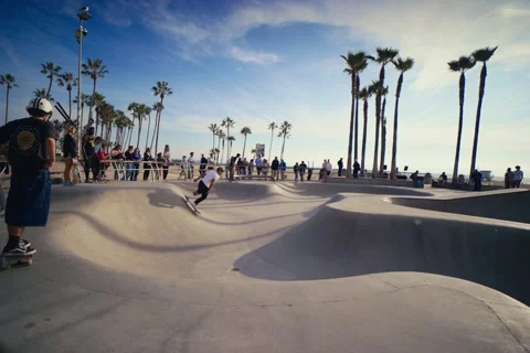 Skater Preparing to Drop Into Venice Beach Skate Park at Sunset Stock Footage 322135841