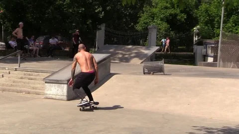 Skater on skateboard performs trick. Slow Motion. Stock Footage 76911909