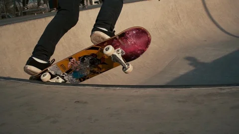 Skater slides down the ramp Stock Footage 128190354