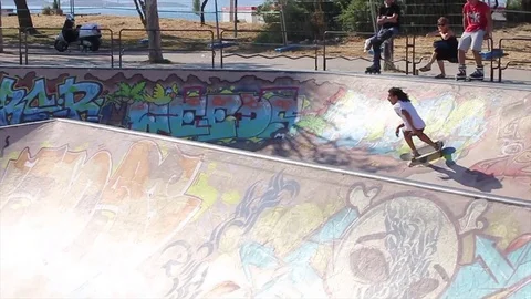 Skaters in half pipe Stock Footage 75431477