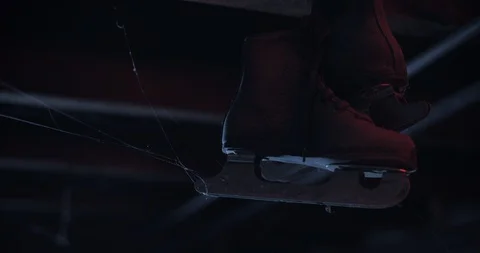 Skates hanging from creepy ceiling Stock Footage 128326094