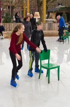 Skating with a chair Stock Photos